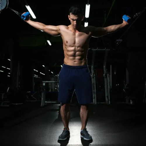 Photo by Valery Sysoev man exercising inside dim room